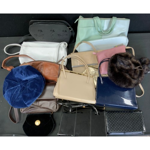 131 - Fashion and Textiles -  A quantity of handbags including Radley, evening bags, purses, leather handb... 