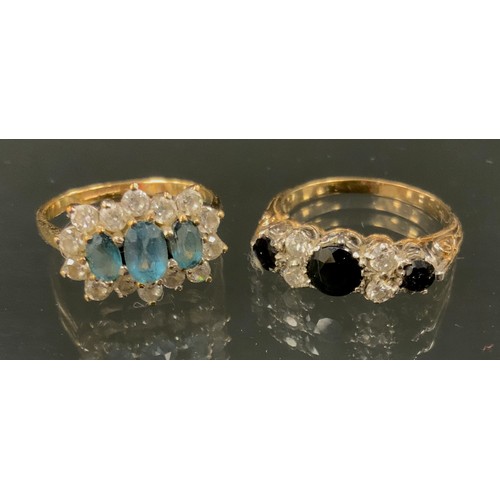 356 - A 9ct gold sapphire and white stone ring, indistinctly marked shank, size Q, 2.8g gross, another pal... 