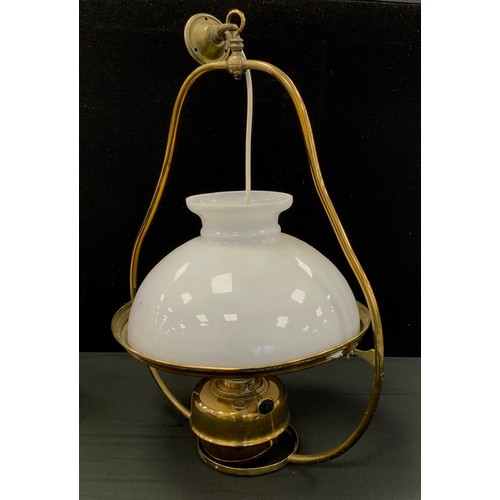 65A - A late Victorian brass hanging oil lamp, 78cm high.