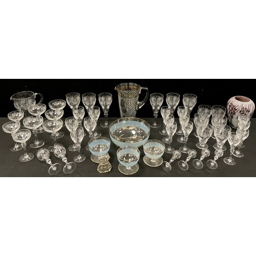 172 - Glassware - A suite of hand engraved drinking glasses inc wine, sherry, Champagne coups, aperitifs, ... 