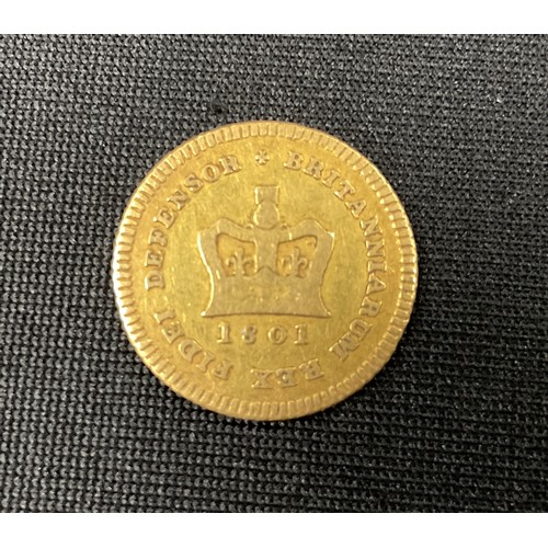 378 - Coins  - a George III 1/3rd of a Guinea gold coin, 1801, 2.7g