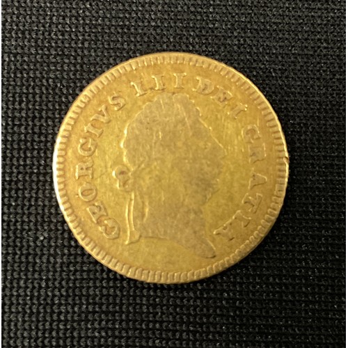 378 - Coins  - a George III 1/3rd of a Guinea gold coin, 1801, 2.7g