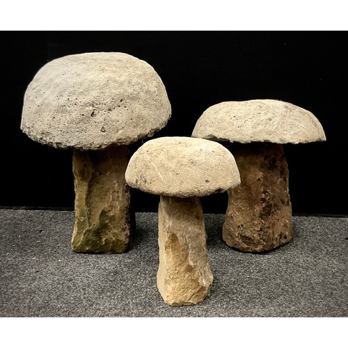 194A - Three graduated staddle stones with reconstituted top, stone base. 53cm high x 40cm deep - 35cm high... 