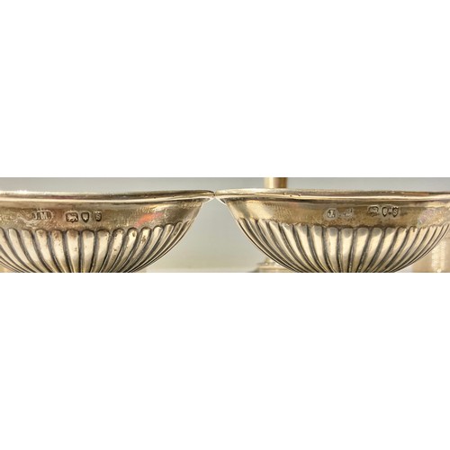 65 - A pair of Victorian boat shaped silver salts, later inscribed '1925-1950', London 1893; three silver... 