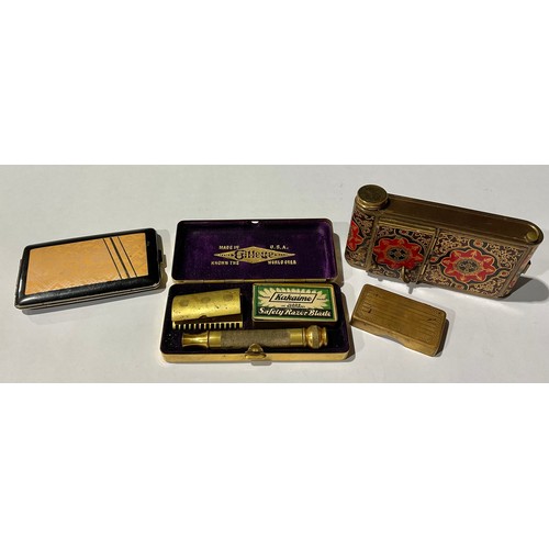 364 - An Art Deco musical vanity case; a Deco case; a Gilette cased razor