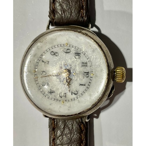 365 - A Vintage WWI trench wristlet watch, with domed glass and visible movement