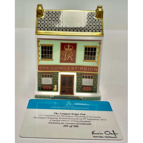 53 - A Royal Crown Derby miniature model of a house, The Longest Reign Pub, 10cm high, commemorates HRH Q... 