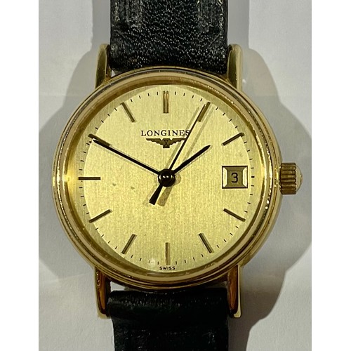 607 - A lady's Longines gold plated stainless steel watch, Champagne dial, baton indicators, centre second... 