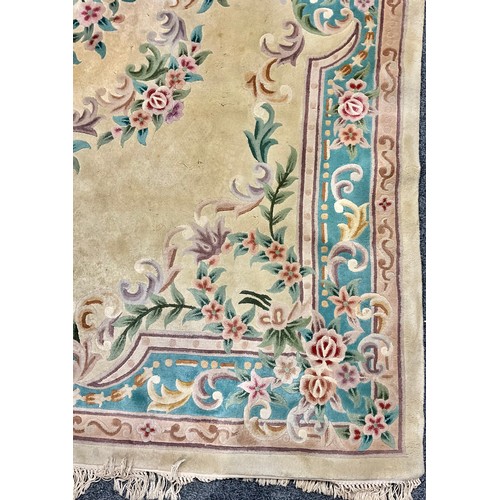 620 - A Chinese wool rug or carpet, 365cm x 271cm