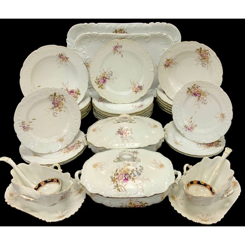 83 - A 20th century dinner service decorated with flowers for six, comprised of two graduated rectangular... 