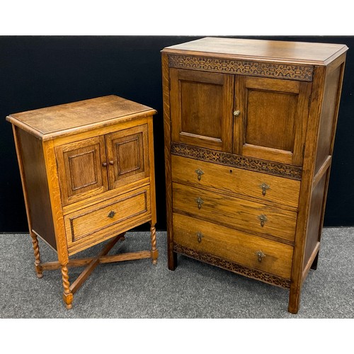 134 - An early 20th century oak side cabinet, pair of small cupboard doors to top, above a single drawer, ... 