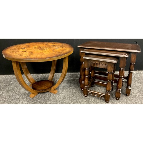 147 - An Art Deco style inlaid walnut occasional table, 46cm high x 64.5cm diameter;  a Priory oak nest of... 