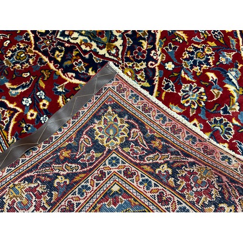 162 - A Central Persian Kashan rug / carpet, hand-knotted with navette-shaped medallion, within a field of... 