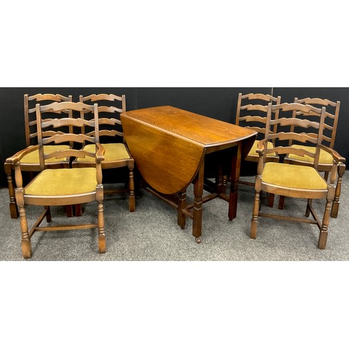 166 - An early 20th century oak drop-leaf dining table, and set of four elm and oak ladder-back dining cha... 