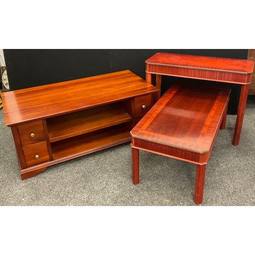 181 - A mahogany coffee table, with four small drawers and shelving to each long side, 50cm high x 123cm x... 