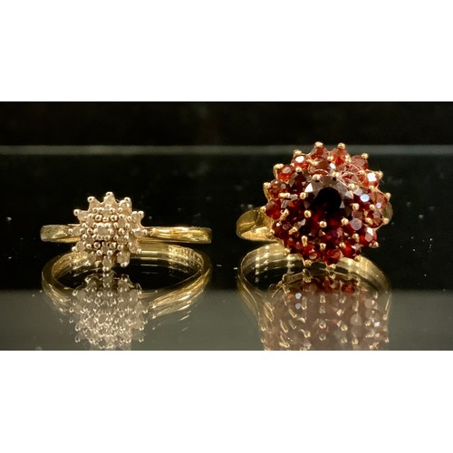 255 - A diamond cluster ring, 9ct gold shank, size Q. 1.7g gross, another garnet, 9ct gold shank, size R, ... 