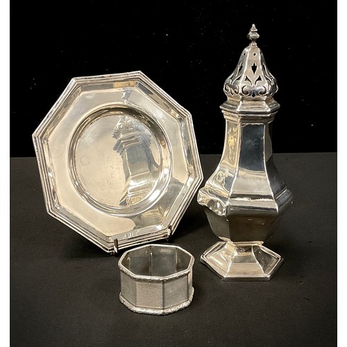 260 - A silver sugar caster, Addie Brothers Birmingham 1928;  Napkin ring, 4.350zt,  an Italian 900 silver... 