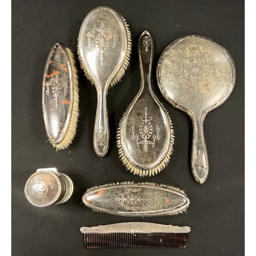 261 - An Edwardian silver and tortoiseshell six piece dressing table set, scent bottle, hand mirror,  hair... 