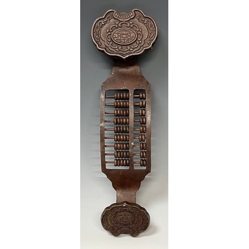 90 - A Chinese Archaic style bronzed metal ruyi sceptre, set with abacus type beads, 32cm long