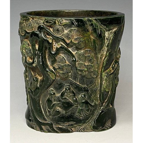 91 - A Chinese carved green stone brush pot, possibly jade, impressed mark, 15.5cm high, 14cm wide