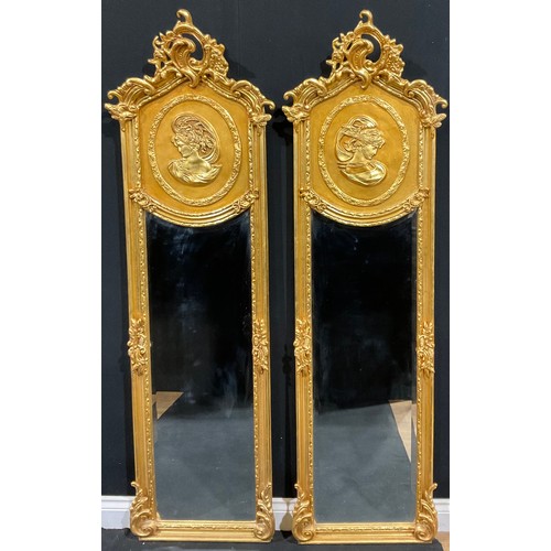 113 - A pair of contemporary Italian Baroque style gilt wall hanging mirrors, each with interlaced foliate... 