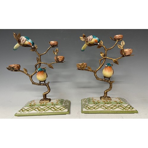 140 - A pair of gilt metal tree stands with hand painted porcelain birds perched on the  tree, faux mark, ... 