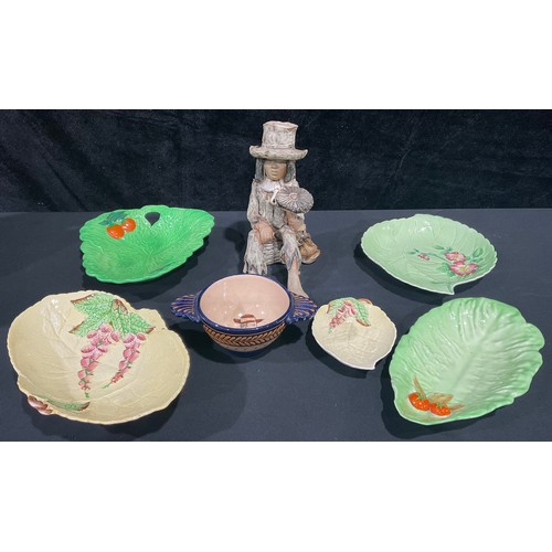 180 - Four pieces of Carltonware; a leaf dish; a Quimper bowl; a Val Newman figure