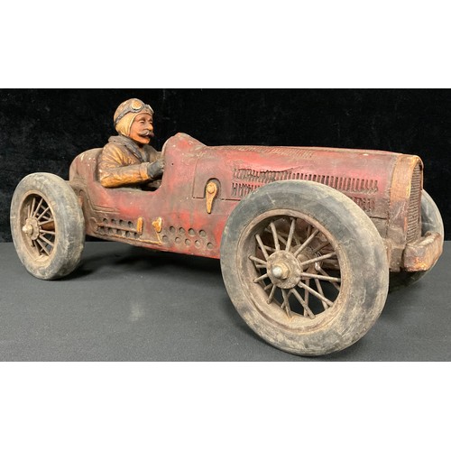 Motoring Interest - a decorative model of a car and driver