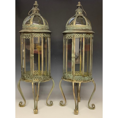 263 - A pair of large verdigris brass lanterns or indoor greenhouse cloches, each 82cm high