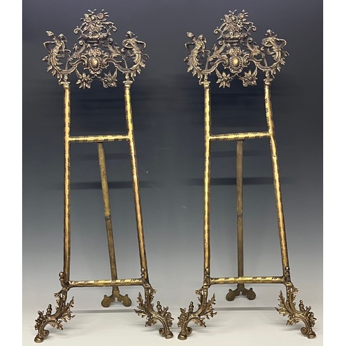 264 - A large pair of gilt metal baroque style easel stands, 80cm high open