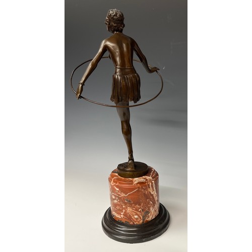 270 - D. Alonzo, after, an Art Deco style bronzed metal hoop dancer, marble base, 48cm high overall