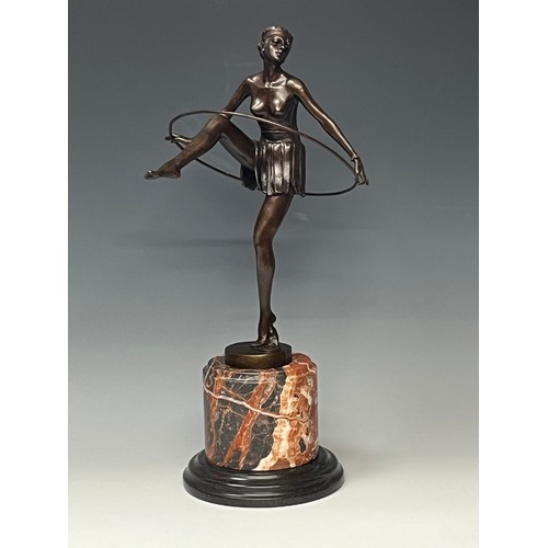 270 - D. Alonzo, after, an Art Deco style bronzed metal hoop dancer, marble base, 48cm high overall