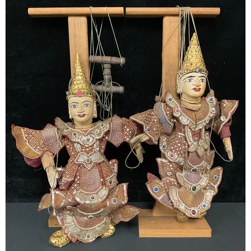 A pair of Indonesian wayang golek puppets, as traditional figures (2)
