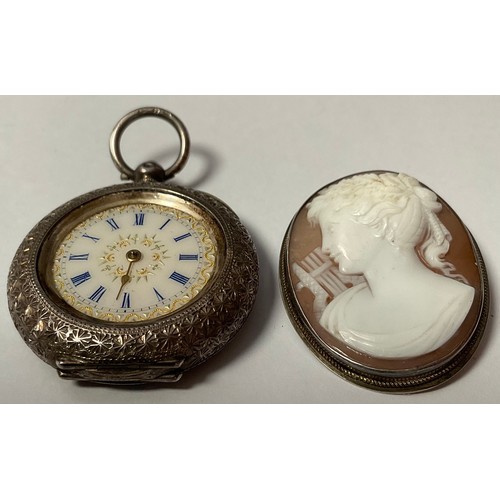 469 - A lady's continental silver open face pocket watch, white enamel dial, Roman numerals, the case chas... 