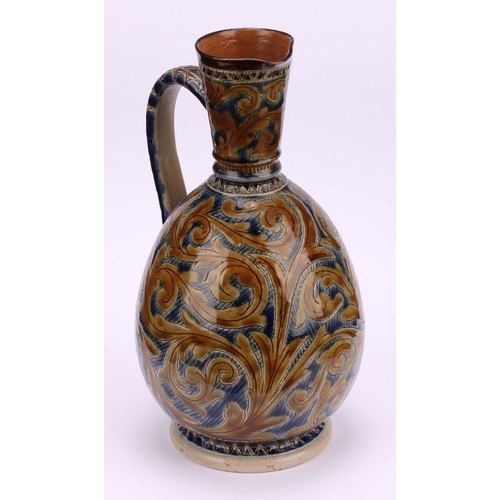 33 - A Doulton Lambeth earthenware ovoid ewer, by Arthur B Barlow, sgraffito incised with stiff and scrol... 