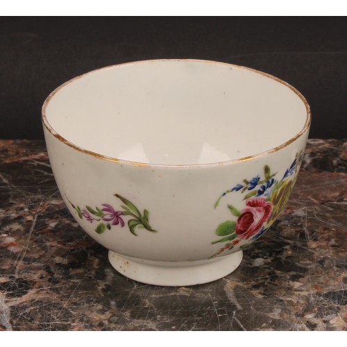 70 - A Caughley teabowl and saucer, painted in polychrome with Back to Back Roses pattern, gilt line rims... 