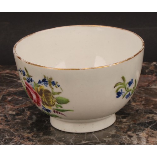 70 - A Caughley teabowl and saucer, painted in polychrome with Back to Back Roses pattern, gilt line rims... 