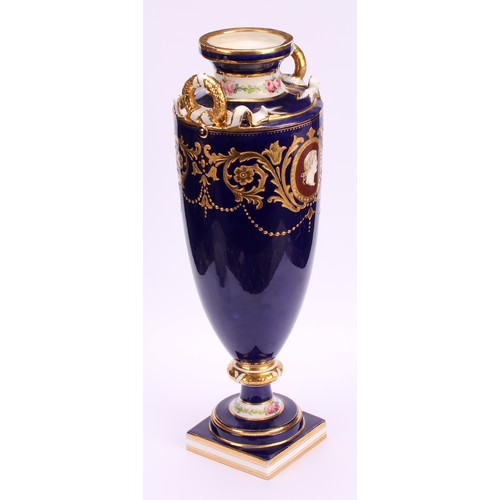 83 - A Minton two-handled pedestal vase, painted with neo-classical portraits in raised gilt oval panels,... 