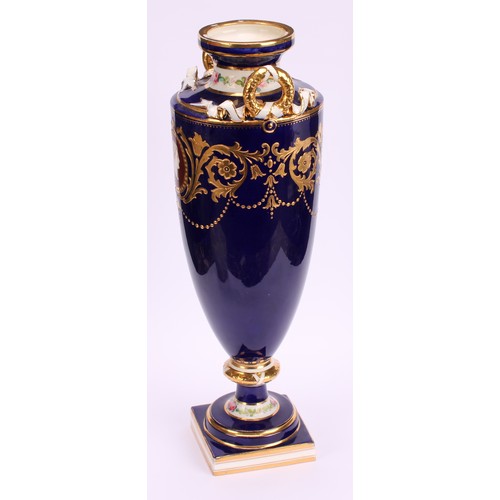 83 - A Minton two-handled pedestal vase, painted with neo-classical portraits in raised gilt oval panels,... 