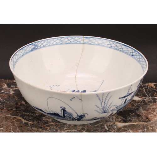 72 - A Chaffers Liverpool punch bowl, painted in Chinoiserie style in underglaze blue, with a fisherman, ... 