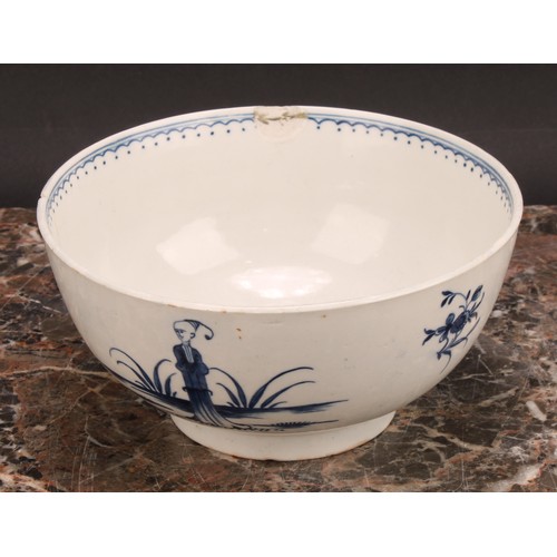 72 - A Chaffers Liverpool punch bowl, painted in Chinoiserie style in underglaze blue, with a fisherman, ... 