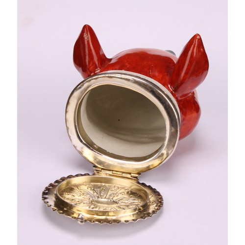 92 - A Staffordshire pottery novelty stirrup cup, modelled as a fox mask, naturalistically painted, silve... 