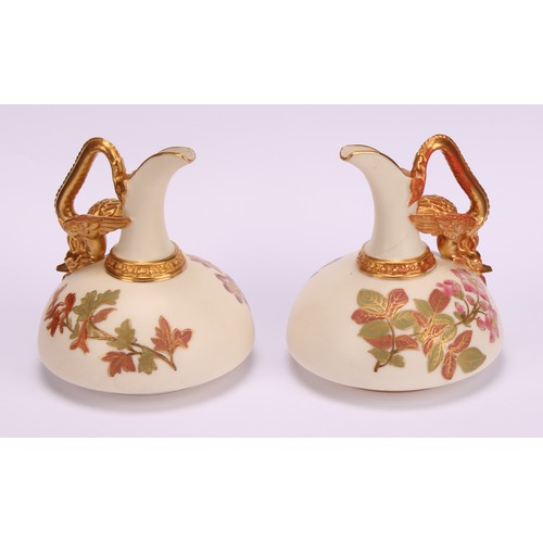 118 - A pair of Royal Worcester ewers, of compressed form, decorated in the Aesthetic manner with flowers ... 