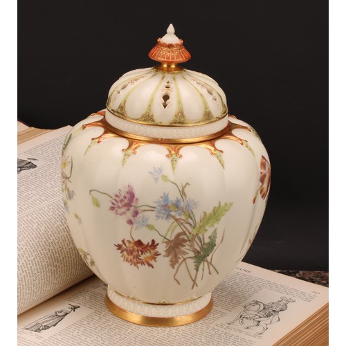 140 - A Royal Worcester lobed ovoid pot pourri vase and cover, painted with flowers on an ivory ground, pi... 