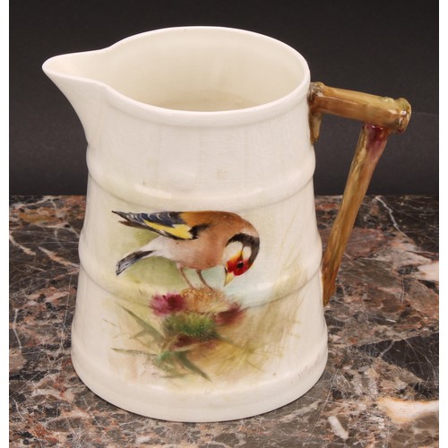 124 - A Royal Worcester barrel shaped jug, painted by W. Powell, signed, with a Goldfinch, 11cm high, prin... 