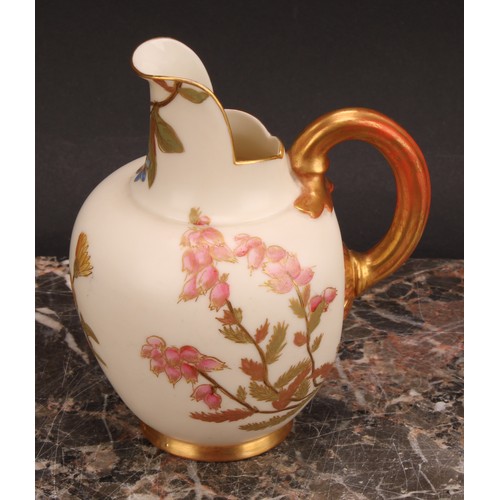 121 - A pair Royal Worcester flat back jugs, decorated in the Aesthetic manner with floral sprays in muted... 