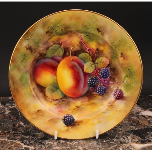 149 - A Royal Worcester plate, painted by Harry Ayrton, signed, painted with peaches and blackberries on a... 