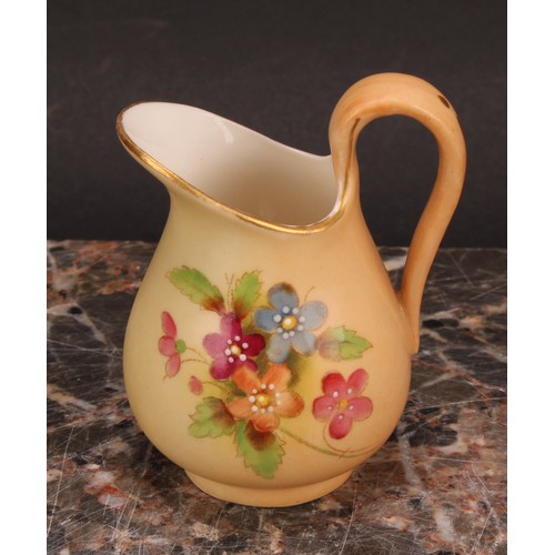 126 - A Royal Worcester blush ivory miniature two-handled vase, decorated with flowers, reticulated slight... 