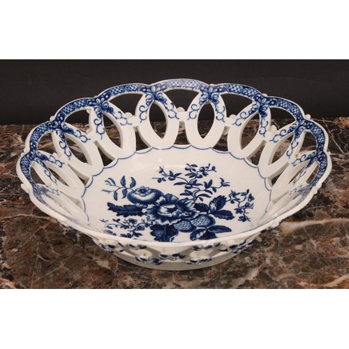 163 - A Worcester Pine Cone pattern shaped circular basket, printed in underglaze blue with peony between ... 