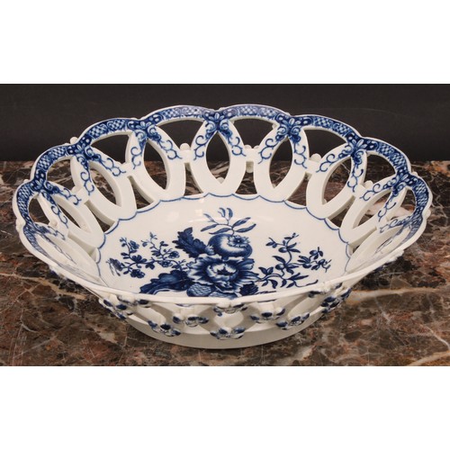 163 - A Worcester Pine Cone pattern shaped circular basket, printed in underglaze blue with peony between ... 